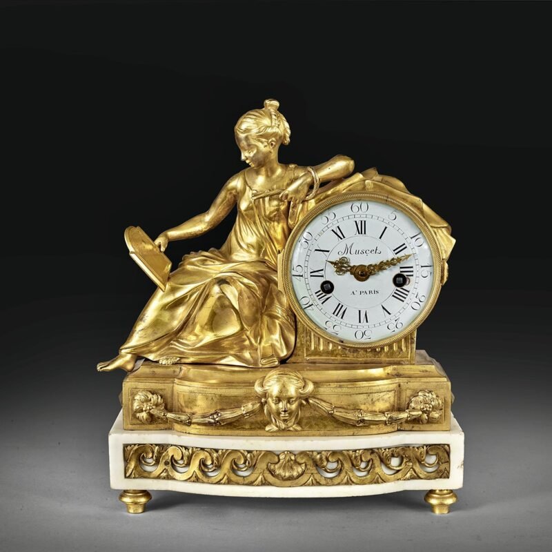 A mantel clock representing a figure of Prudence